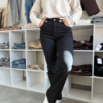 Model wearing black Kelsey Ankle Flare Jeans rom KUT