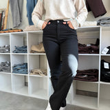 Model wearing black Kelsey Ankle Flare Jeans rom KUT